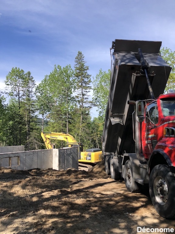 étapes construction maison: le remblai de fondation