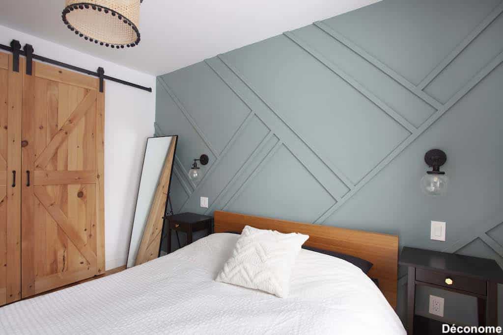 Accent wall lattes géométriques mur vert chambre